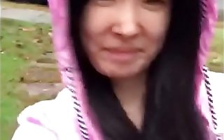 Asian Teen publicly reveals herself in the rain!